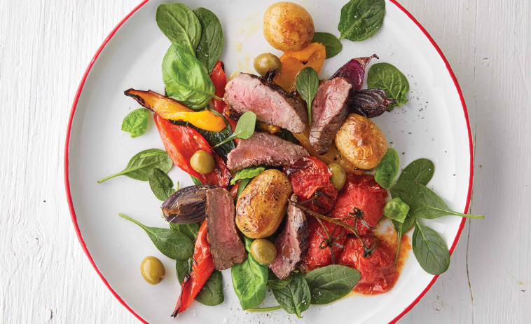 Venison with Mediterranean-style Tomatoes on a white plate