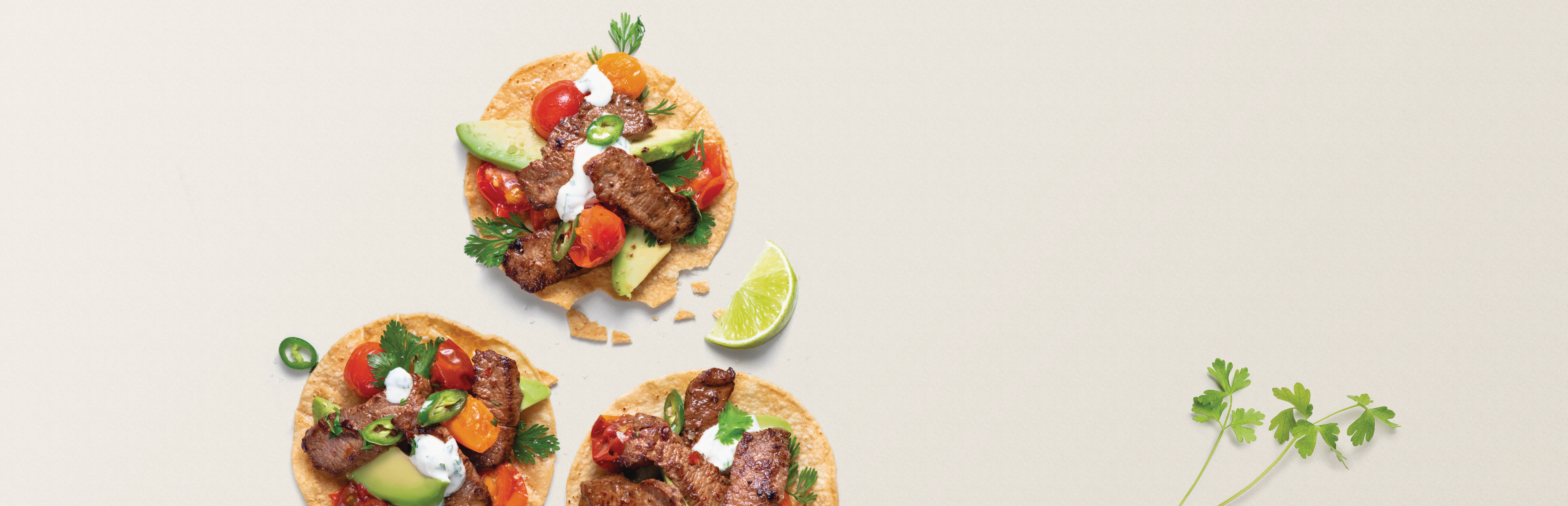 Lamb Stir-Fry Tostadas with Coriander and Lime Dressing
