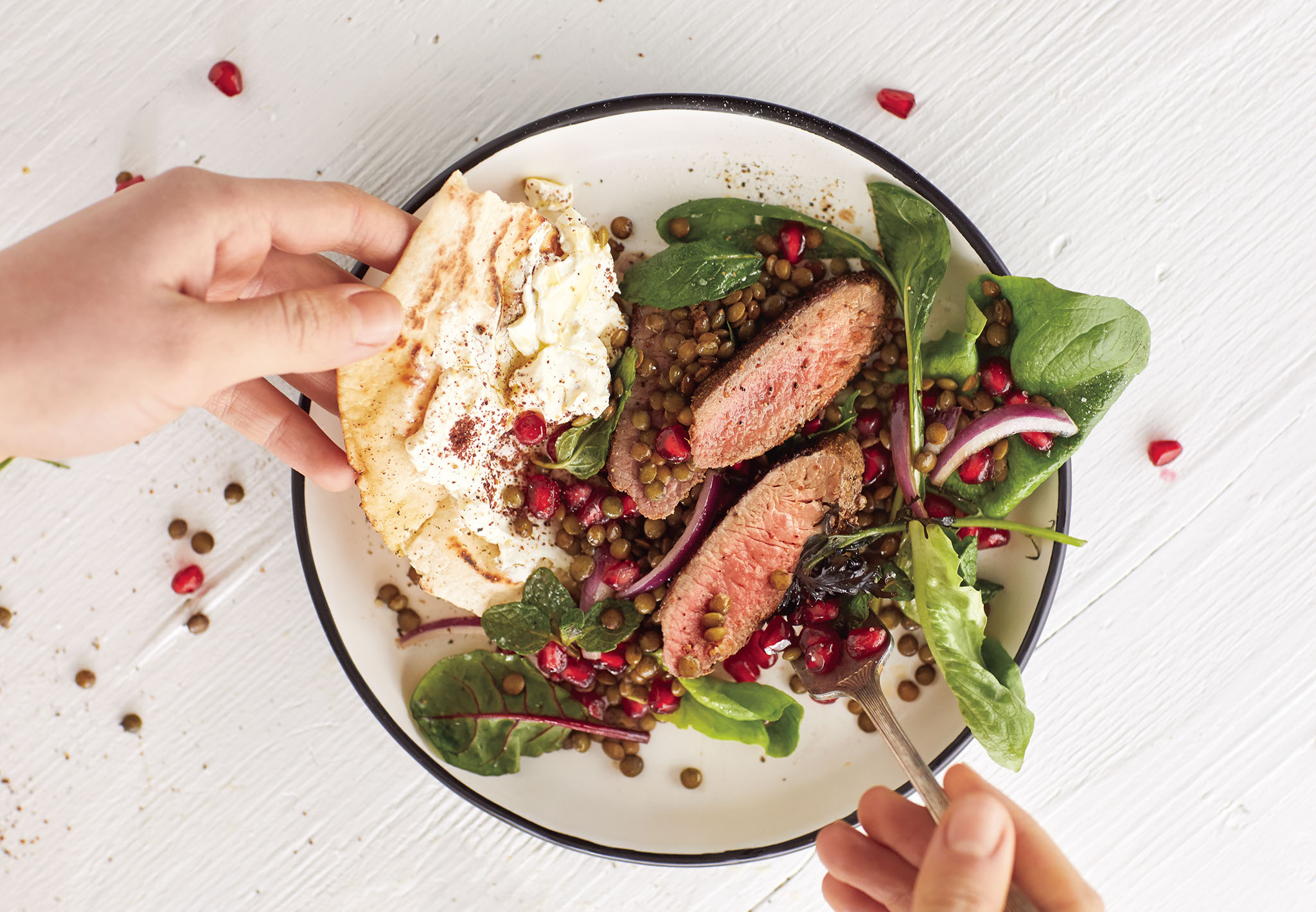 Lamb and French Puy Lentil Salad with Flatbread on a white plate