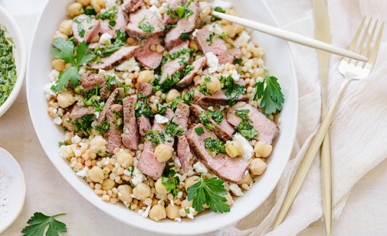 Chimichurri Lamb Medallions with Couscous and Chickpeas in a white bowl