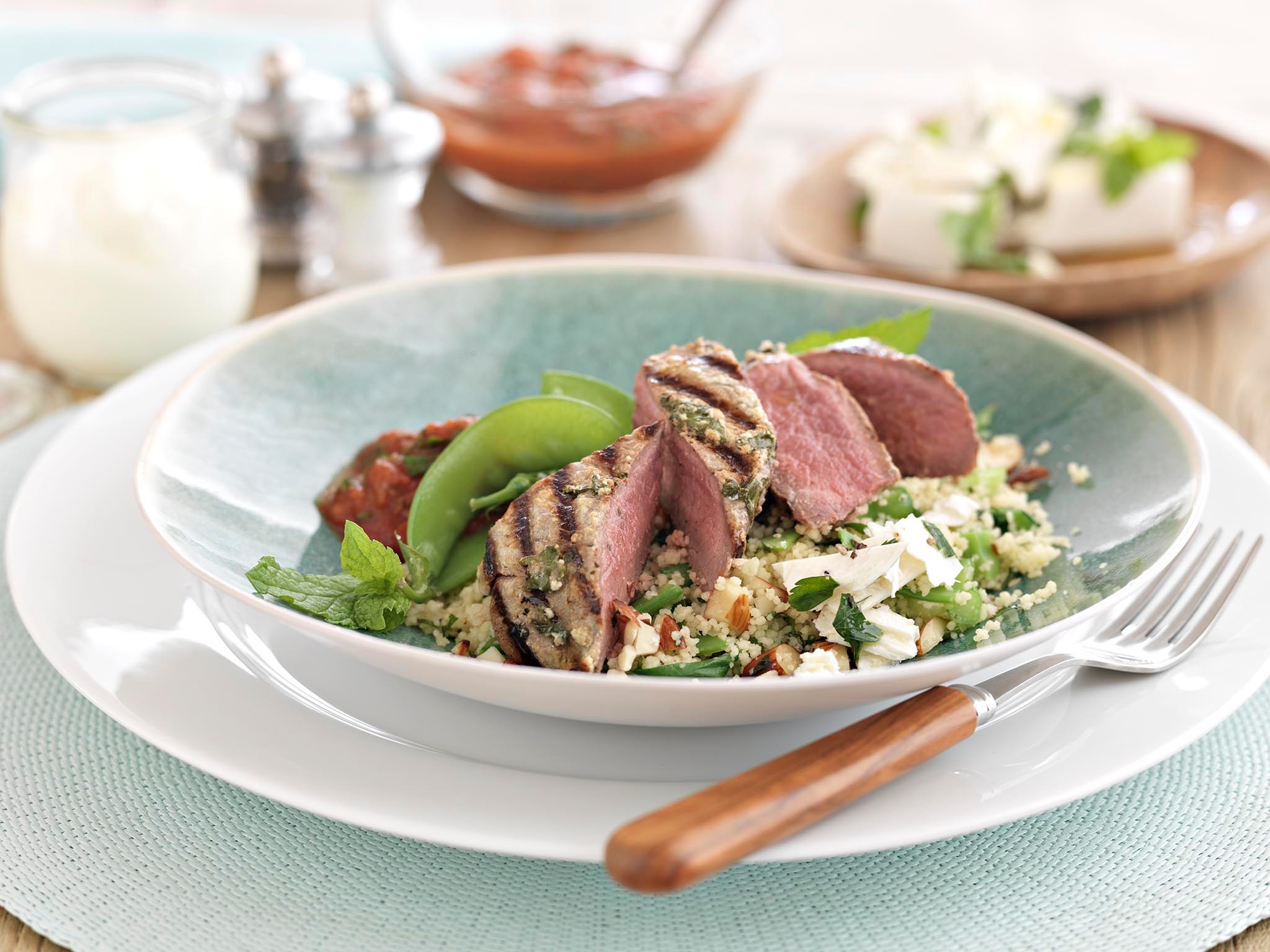 Lamb Steak with Yogurt and Coriander Marinade in bowl served on a table 