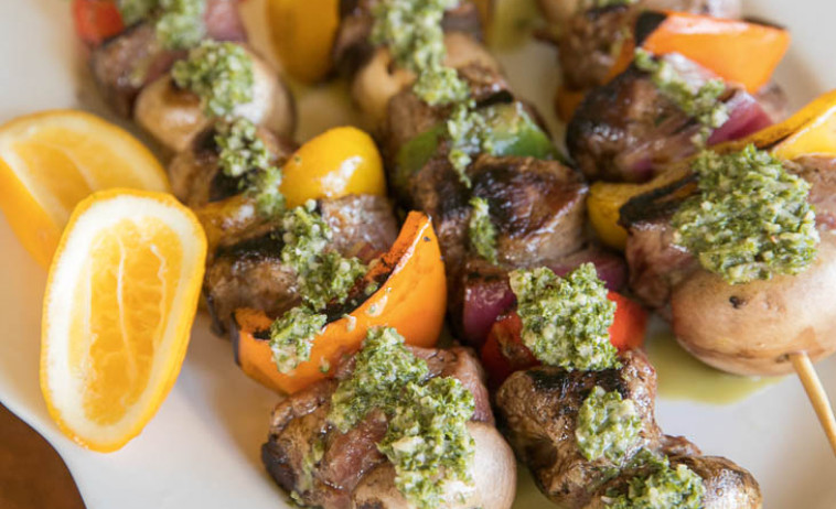 bbq lamb kebabs with lemon wedges