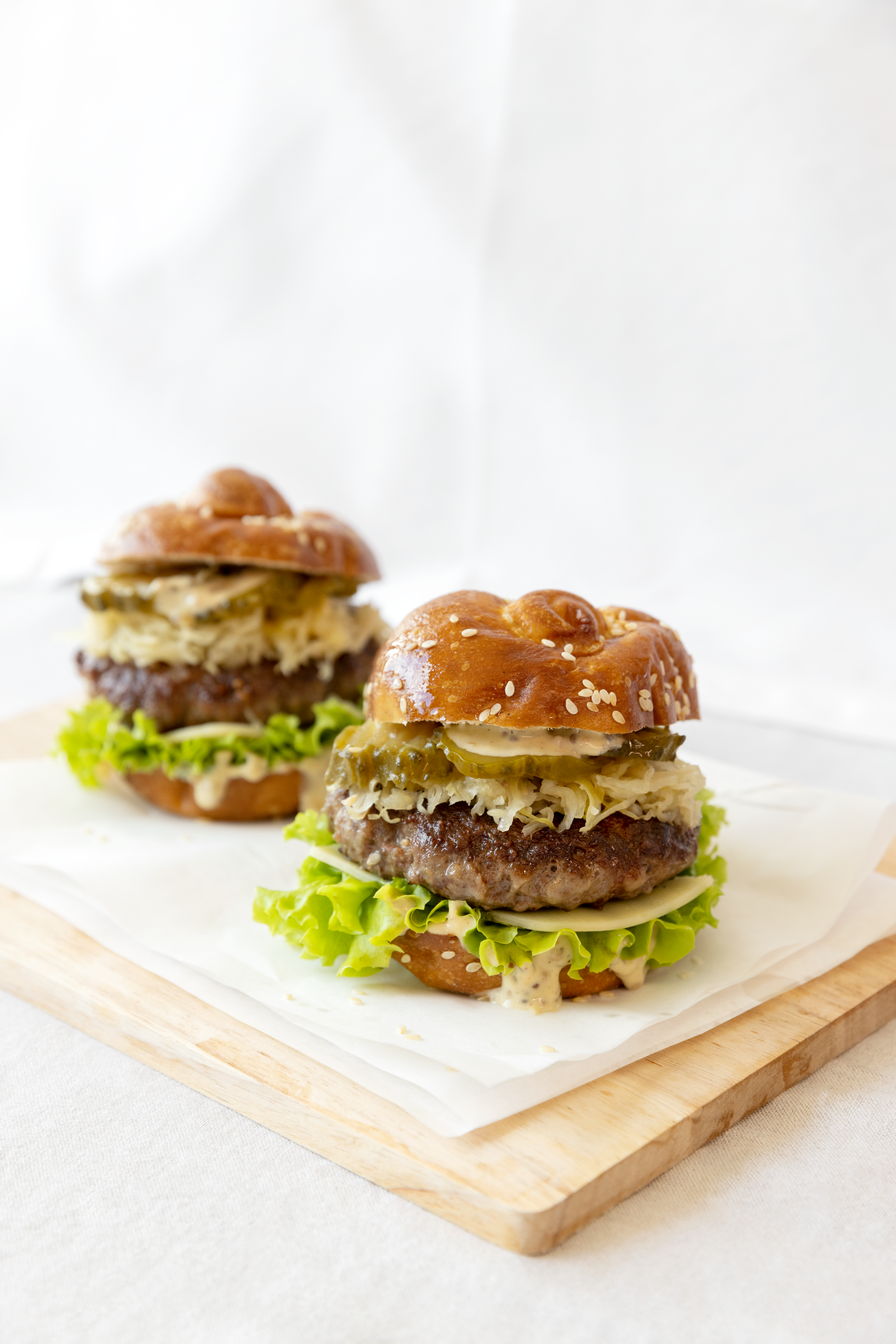 Beef Brisket Sauerkraut Burger on a chopping board