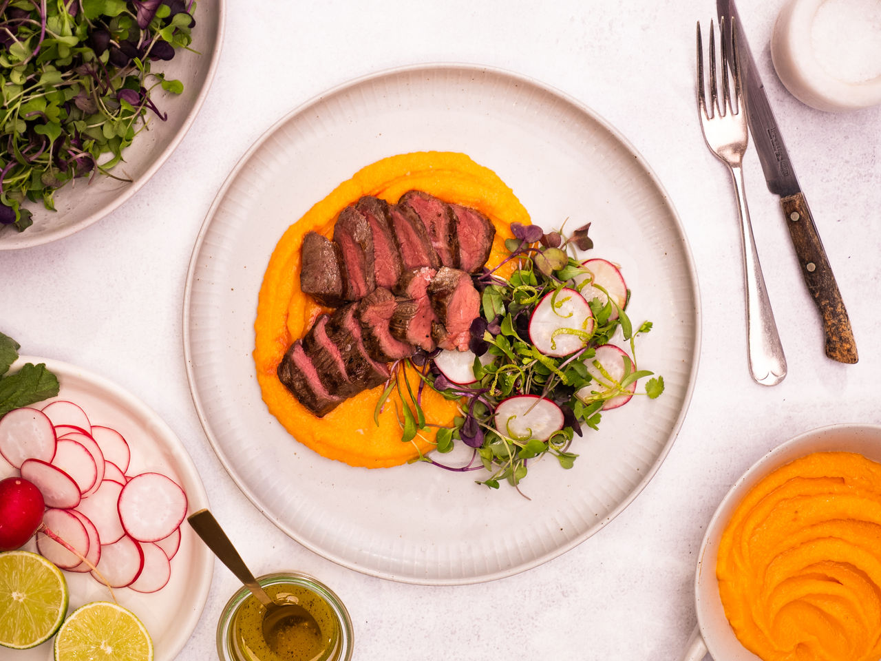 Lamb Medallions, Kūmara Puree and Microgreen Salad