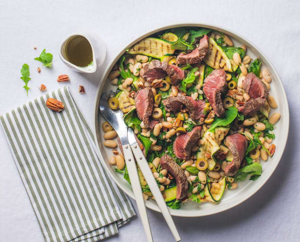 BBQ Beef Eye Fillet Steaks with Sicilian Grilled Zucchini White Bean Salad Silver Fern Farms