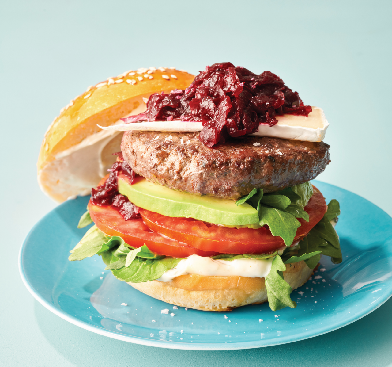 Beef and Horopito Pepper Burger with Beetroot Relish on a blue plate