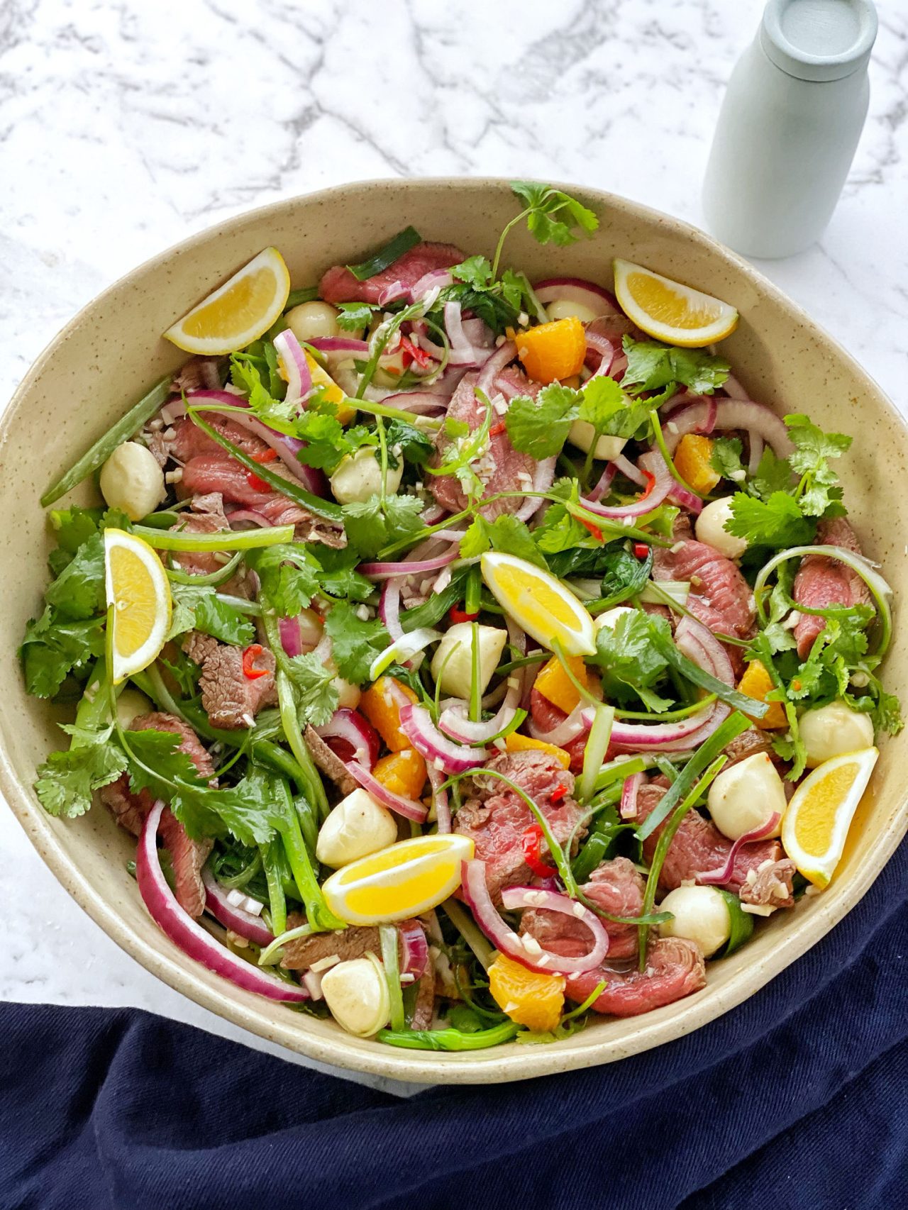 Beef Eye Fillet Steaks, Bocconcini, Choy Sum, Orange, Coriander, and Spring Onion Salad