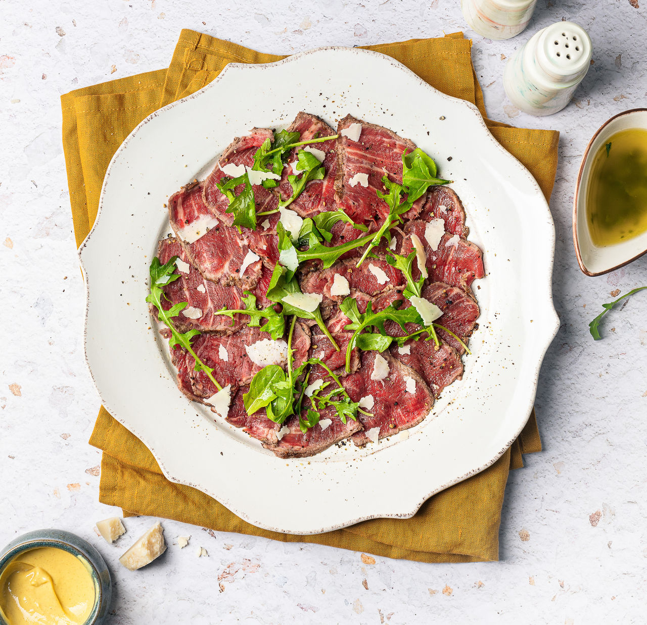 Grilled Beef Eye Fillet Carpaccio with Rocket & Parmesan