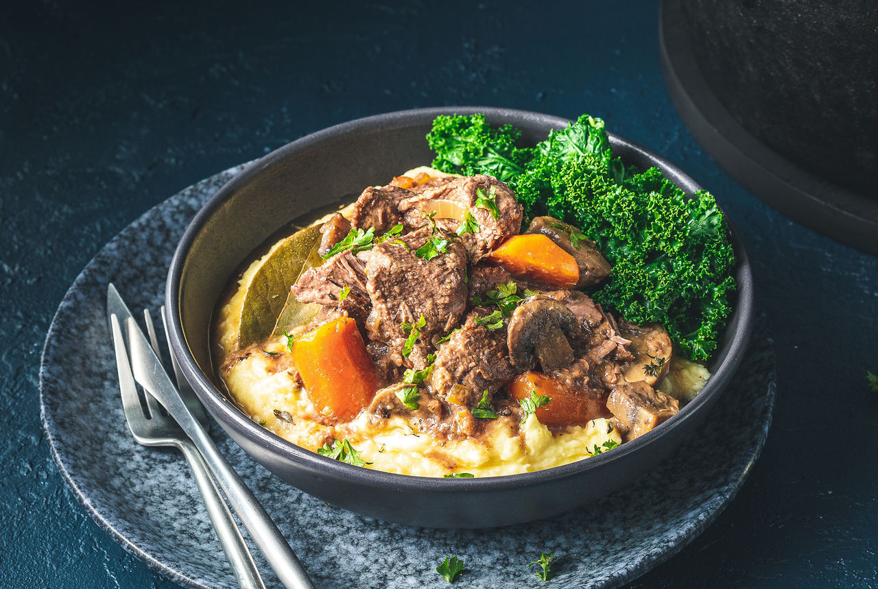 Hearty Venison Stew with Mashed Potatoes and Kale