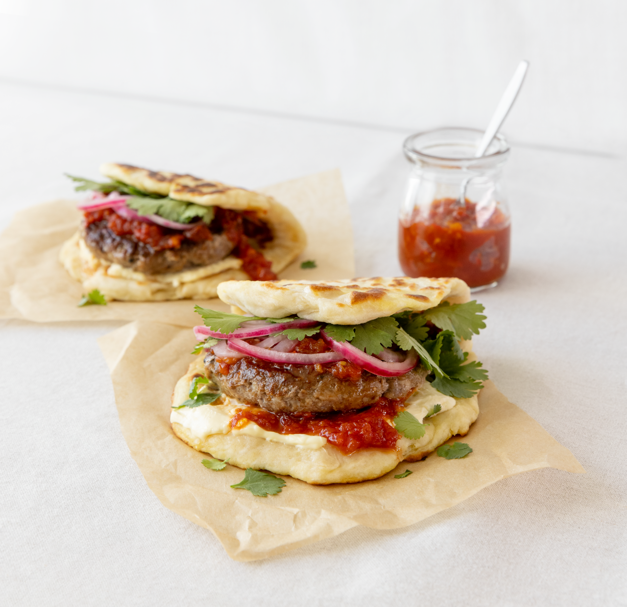 Indian Spiced Lamb Rump Burger with Naan on paper