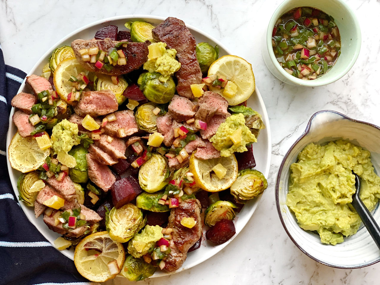  Lamb Medallions with Beetroot, Brussel Sprouts, Smashed Avocado, & Double Onion Salsa