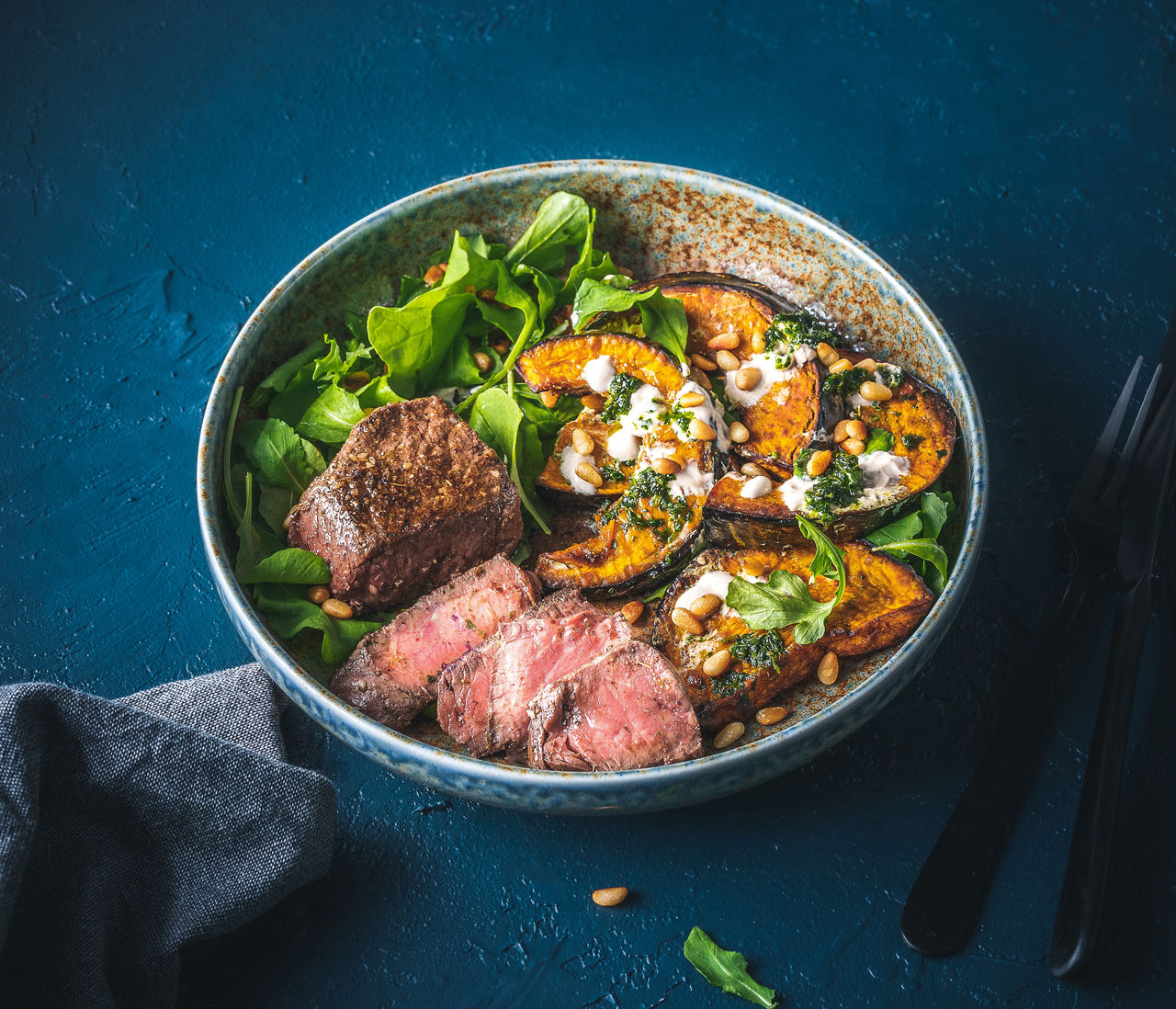 Zataar Rubbed Beef Medallions with Roasted Pumpkin Wedges and Yogurt Sauce