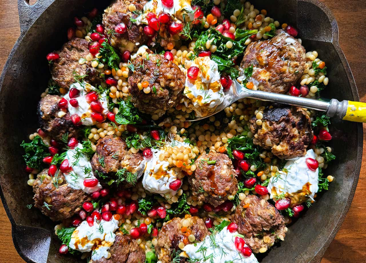 Minty Venison-Feta Meatballs with Pearl Couscous, Pomegranate, Kale, and Labne