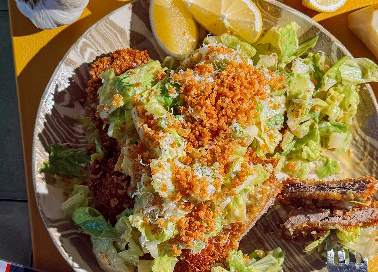 Spicy Caesar Salad over Crispy Venison